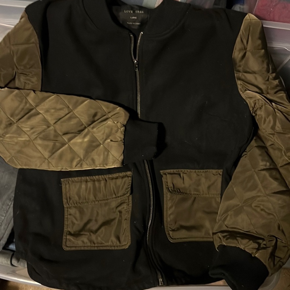 Black and green bomber jacket